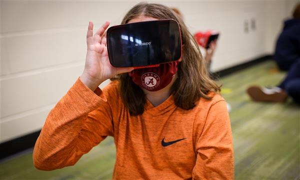 Students use virtual reality headsets